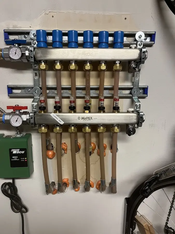 Plumber performing Water Heater Repair at a residential property in Pine City